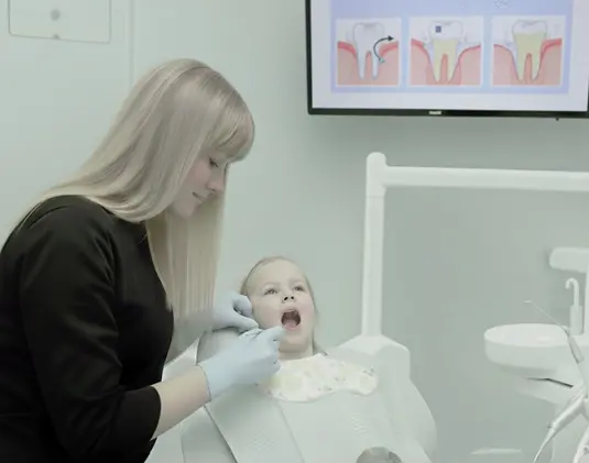 Фторування зубів у дітей фото