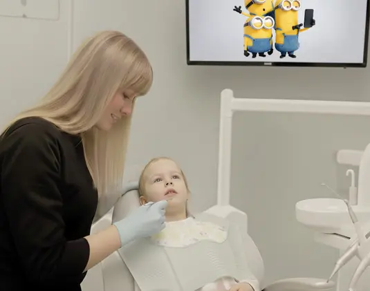 Professional teeth cleaning for children photo